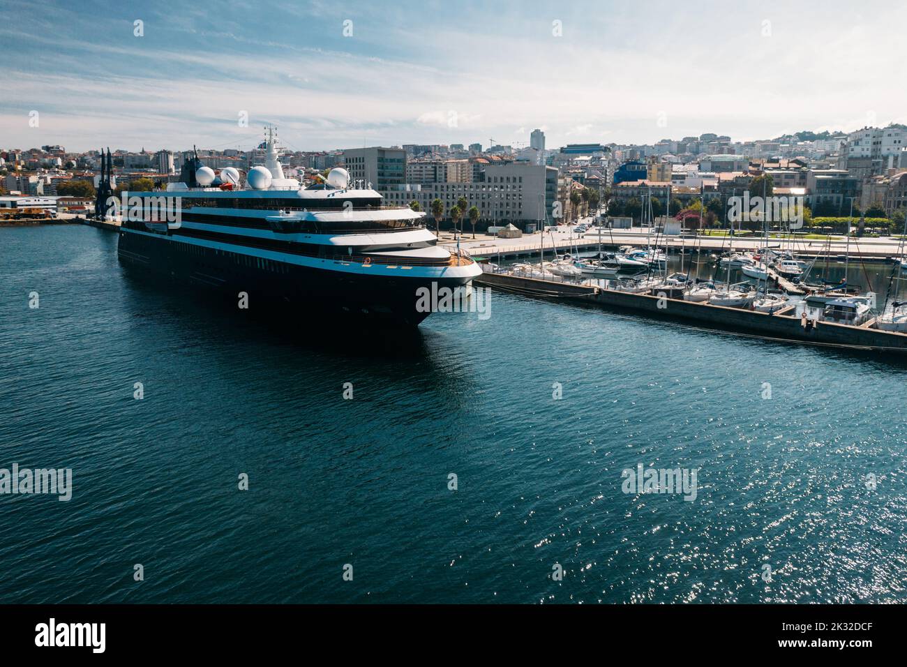 Aerial drone view of cruise ship, marina and view of centre of Vigo, Galicia, Spain Stock Photo