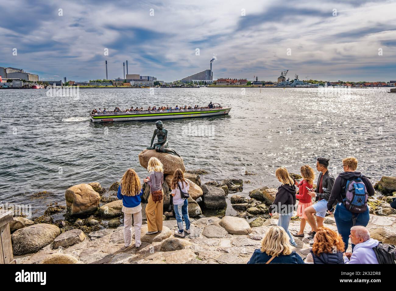 Little mermaid statue in Copenhagen with a lot of tourists, Denmark Stock Photo