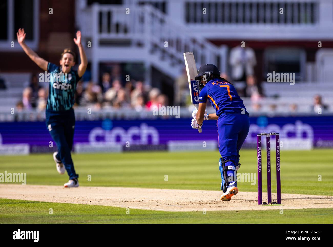 England's Kate Cross celebrates the wicket of India's Harmanpreet Kaur with teammates during the third women's one day international match at Lord's, London. Picture date: Saturday September 24, 2022. Stock Photo
