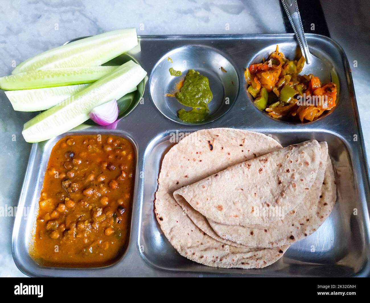 A close up shot of a North Indian home made lunch served. Dehradun, uttarakhand India. Stock Photo