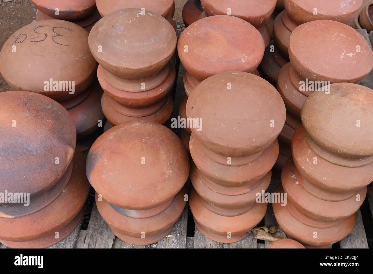 Upside down clay pots hires stock photography and images Alamy