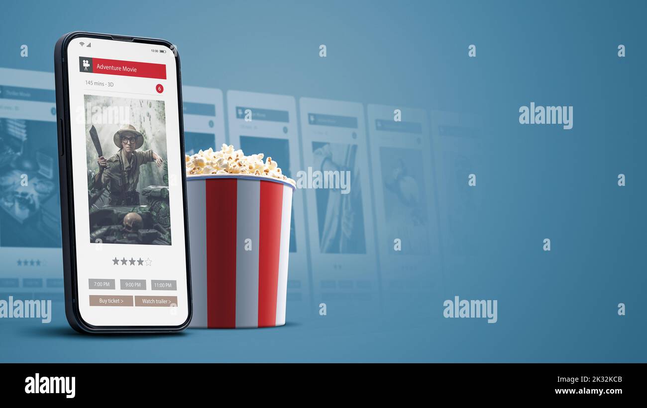 Movies schedule and online ticket booking on smartphone app Stock Photo