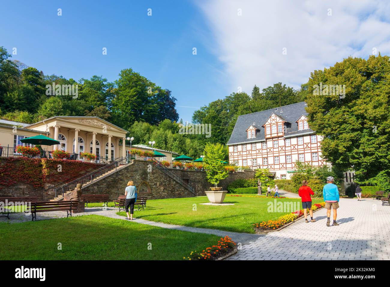Thermalbad Wiesenbad: spa with Wandelhalle (foyer house), cafe, cyclists in Erzgebirge, Ore Mountains, Sachsen, Saxony, Germany Stock Photo