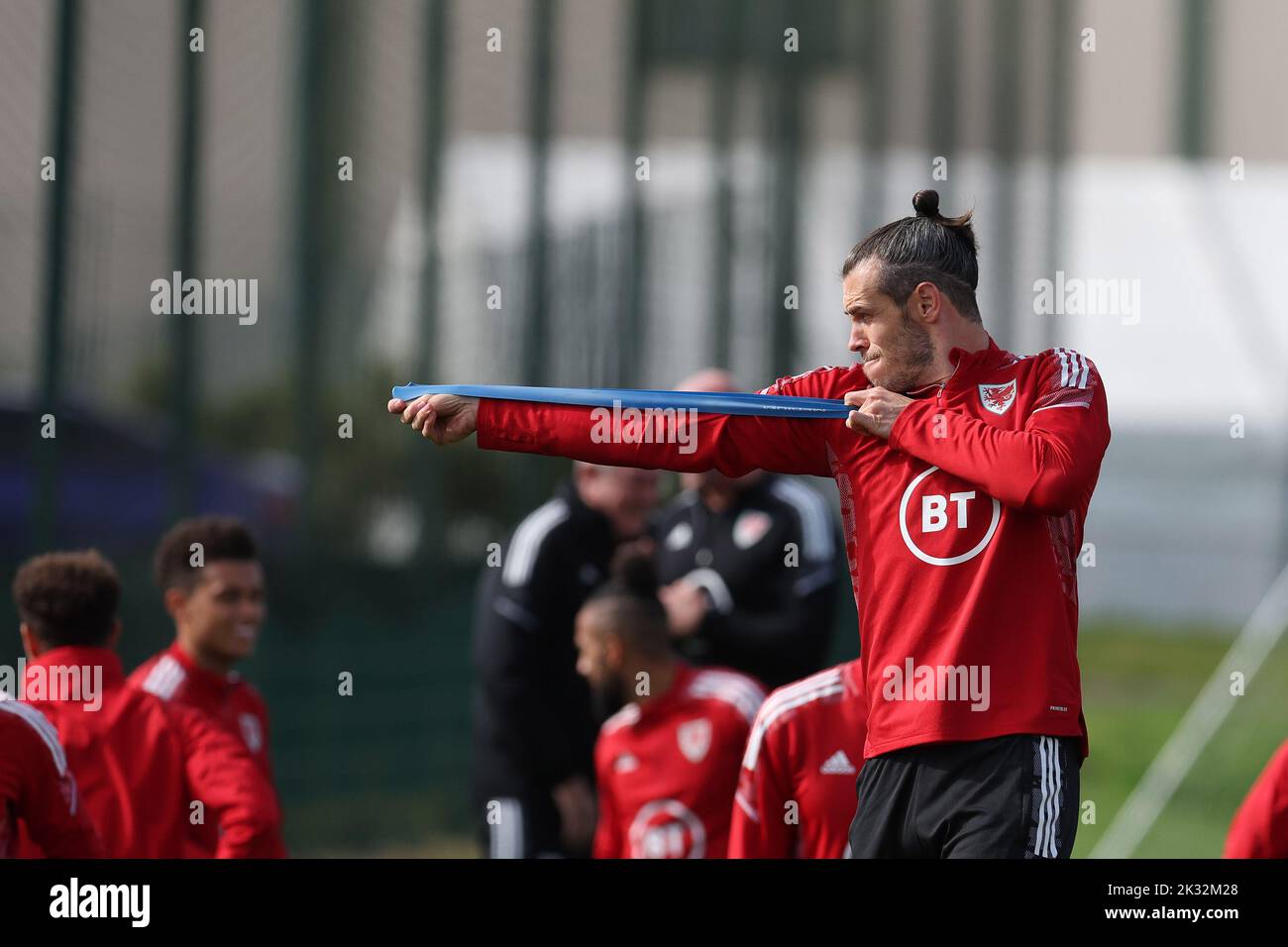 Cardiff, UK. 24th Sep, 2022. Gareth Bale of Wales jokes around pretending to do archery during the Wales football team MD1 training session at the Vale Resort, Hensol, near Cardiff on Saturday 24th September 2022. The team are preparing for their next match, a UEFA Nations league match against Poland tomorrow . this image may only be used for Editorial purposes. Editorial use only, pic by Andrew Orchard/Andrew Orchard sports photography/Alamy Live news Credit: Andrew Orchard sports photography/Alamy Live News Stock Photo