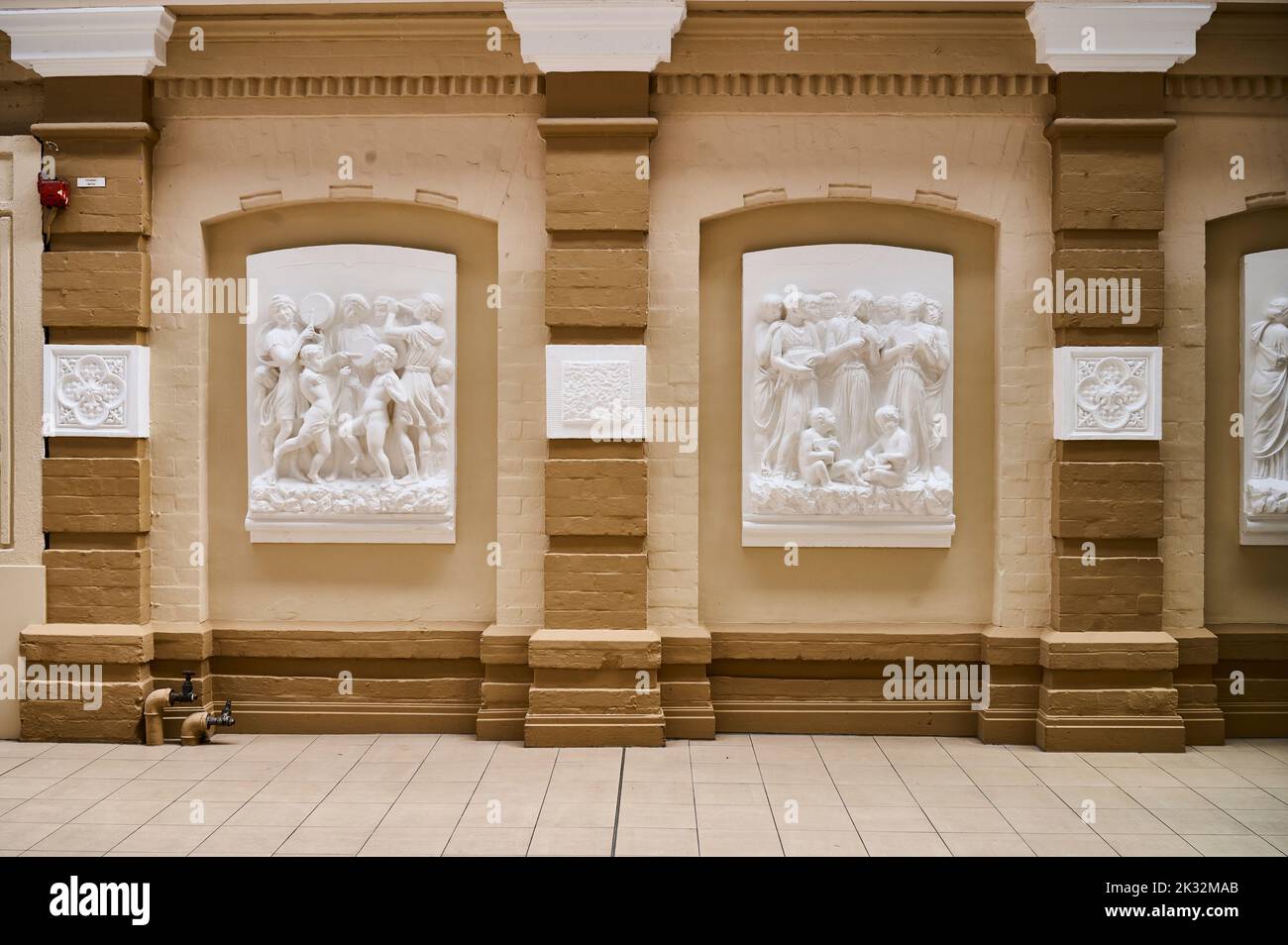 Entertainment theamed bas-relief on the walls of the Winter gardens,Blackpool,uk Stock Photo