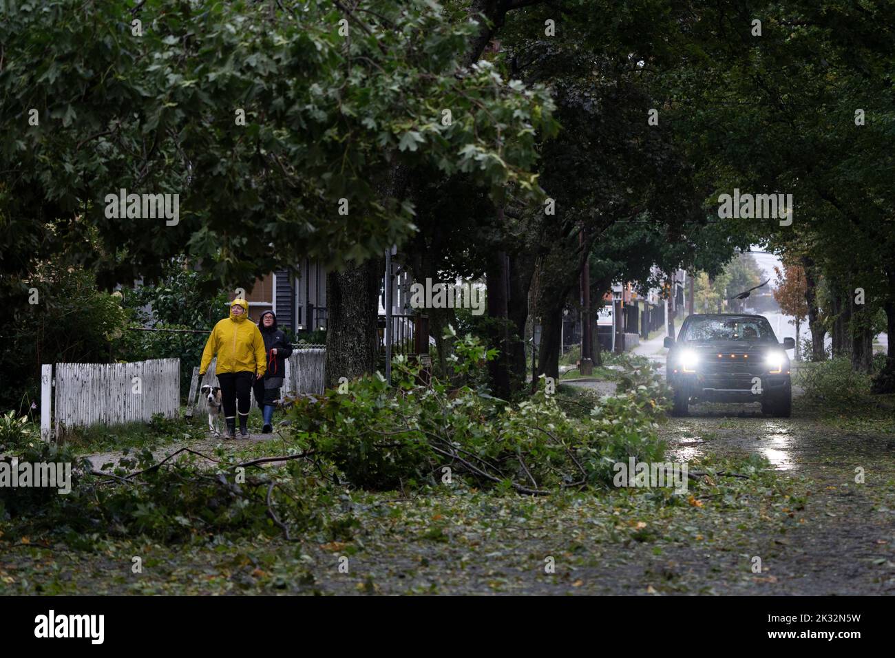 Canada. 23rd Sep, 2022. Pedestrians survey the damage in Halifax as