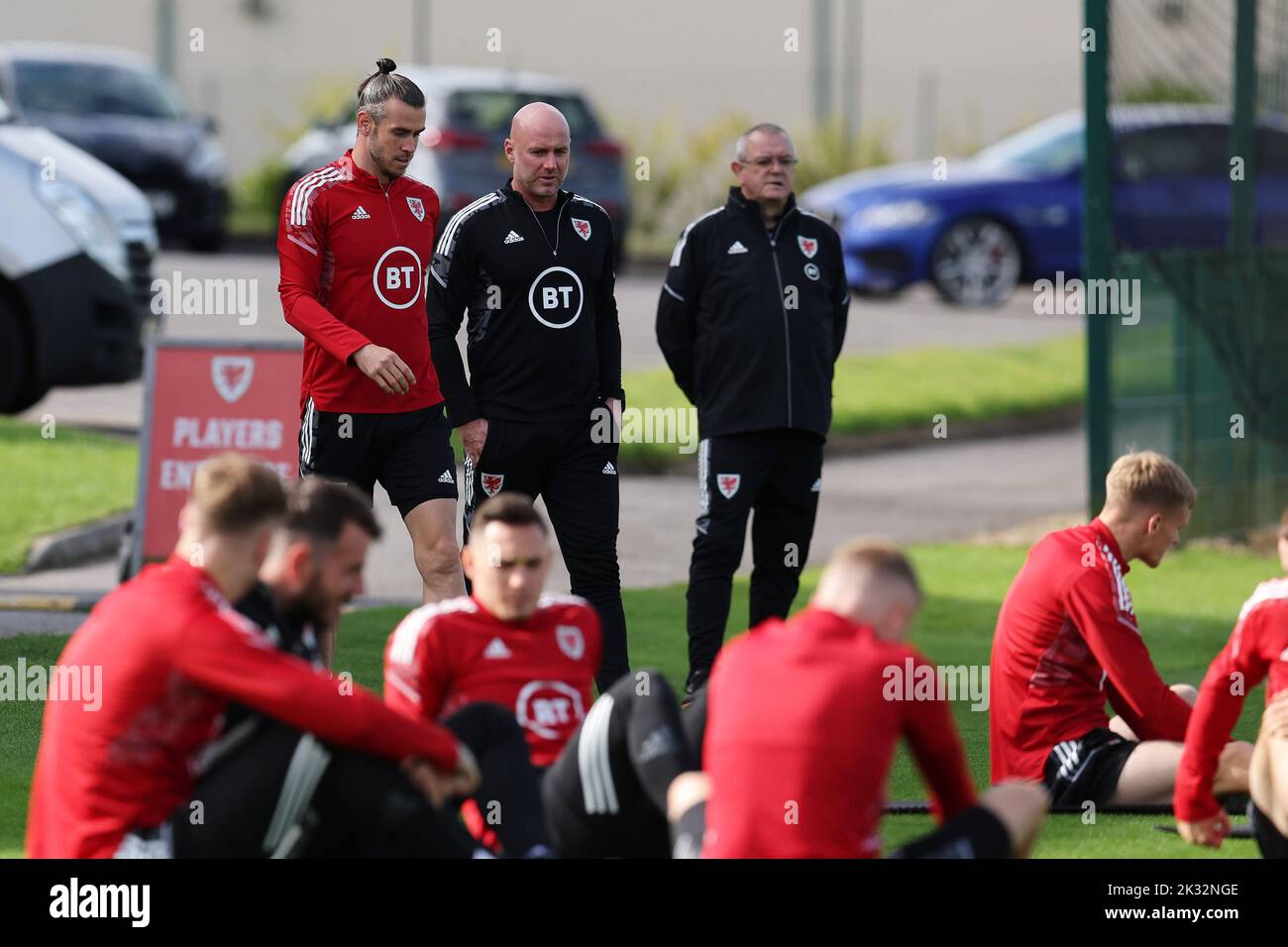 Cardiff, UK. 24th Sep, 2022. Gareth Bale of Wales chats with Rob aPage, the head coach/manager of Wales during the Wales football team MD1 training session at the Vale Resort, Hensol, near Cardiff on Saturday 24th September 2022. The team are preparing for their next match, a UEFA Nations league match against Poland tomorrow . this image may only be used for Editorial purposes. Editorial use only, pic by Andrew Orchard/Andrew Orchard sports photography/Alamy Live news Credit: Andrew Orchard sports photography/Alamy Live News Stock Photo