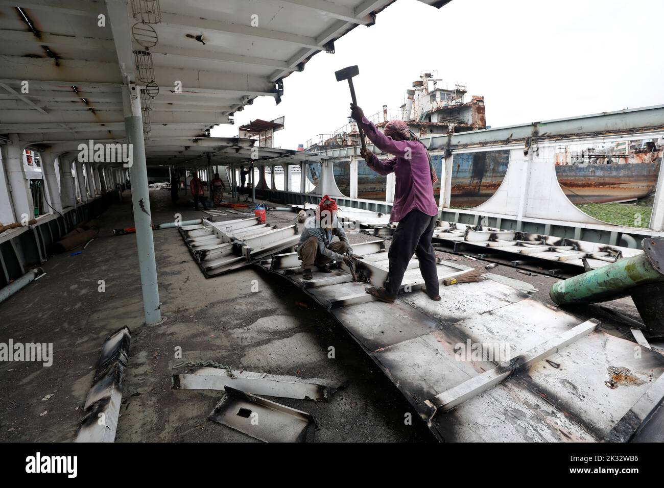 Dhaka, Bangladesh September 24, 2022 Worker cleaning up launch at