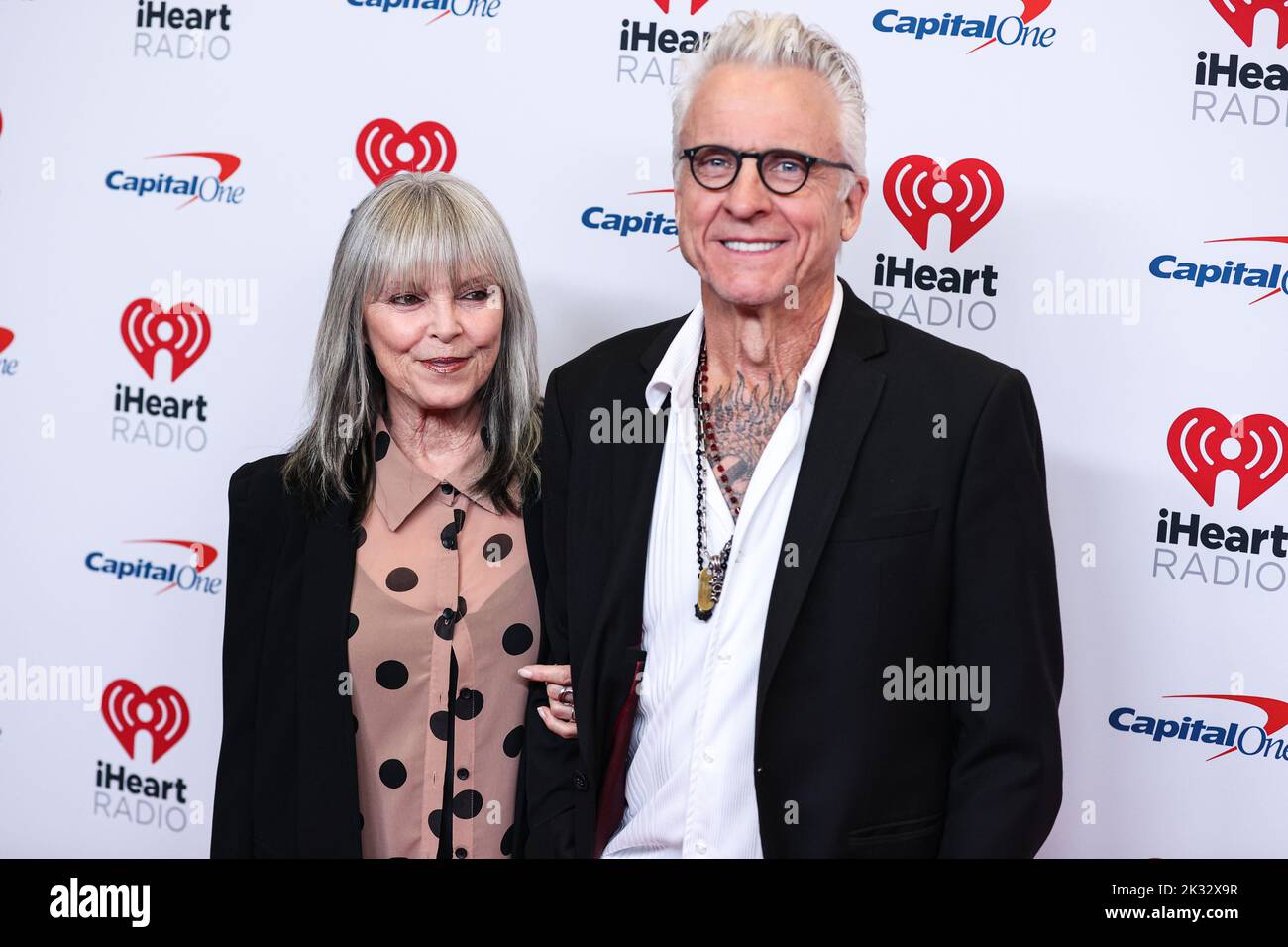 Las Vegas, United States. 23rd Sep, 2022. LAS VEGAS, NEVADA, USA - SEPTEMBER 23: Pat Benatar and Neil Giraldo pose in the press room at the 2022 iHeartRadio Music Festival - Night 1 held at the T-Mobile Arena on September 23, 2022 in Las Vegas, Nevada, United States. (Photo by Xavier Collin/Image Press Agency) Credit: Image Press Agency/Alamy Live News Stock Photo