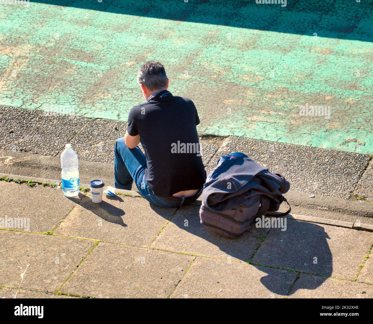 Glasgow, Scotland, UK 24th September,  2022. UK Weather: Hot and Sunny in the city saw locals an tourists take to the streets.. The clyde walkway at the side of the river has turned into a riverside grafitti art gallery.  Credit Gerard Ferry/Alamy Live News Stock Photo