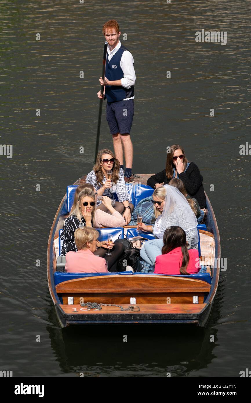 A bridge enjoys a punt tour with her hen party along the River Cam in Cambridge. Picture date: Saturday September 24, 2022. Stock Photo