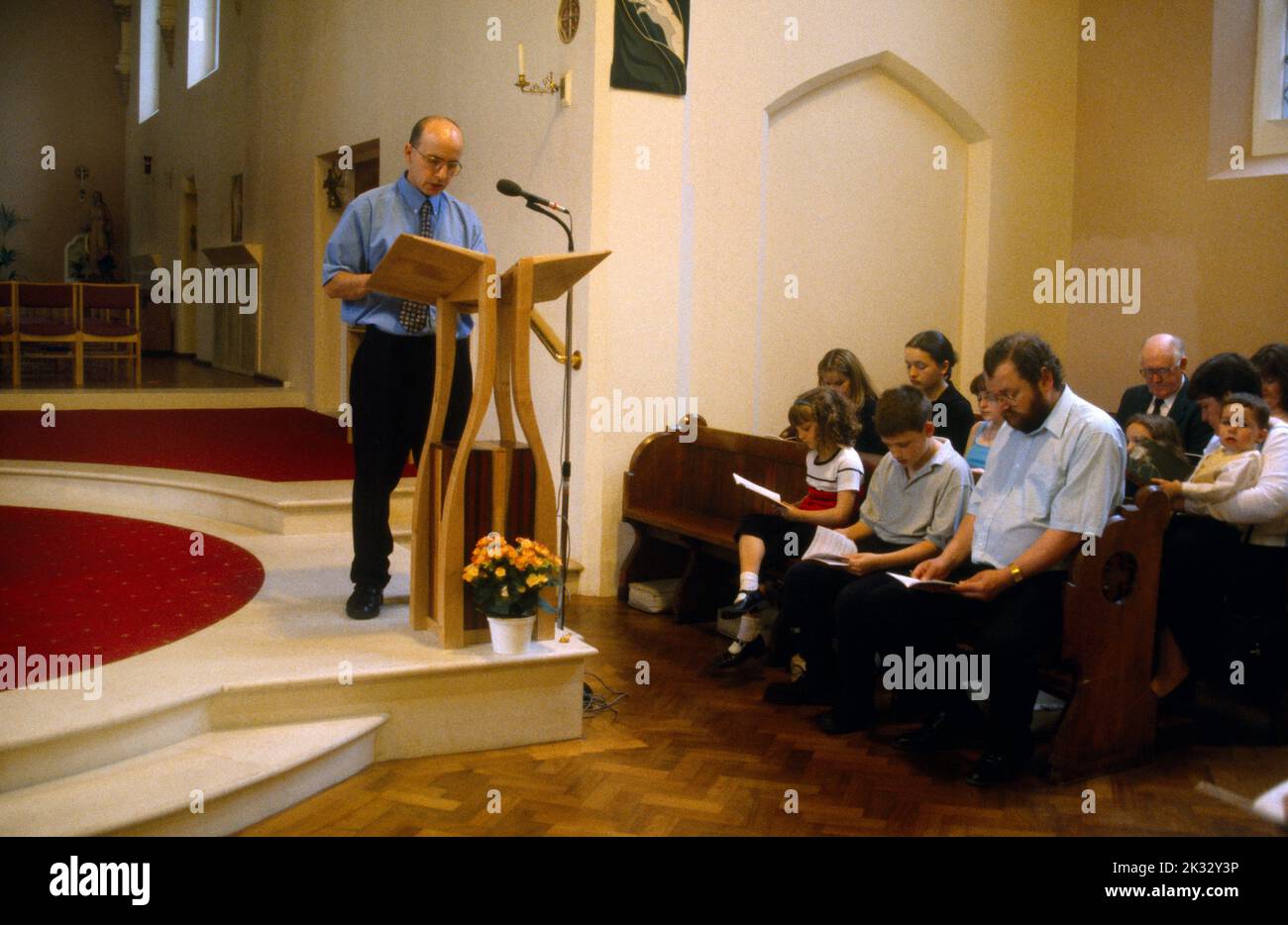 Father Reading Lesson At Baptism St Joseph's Catholic Church Roehampton