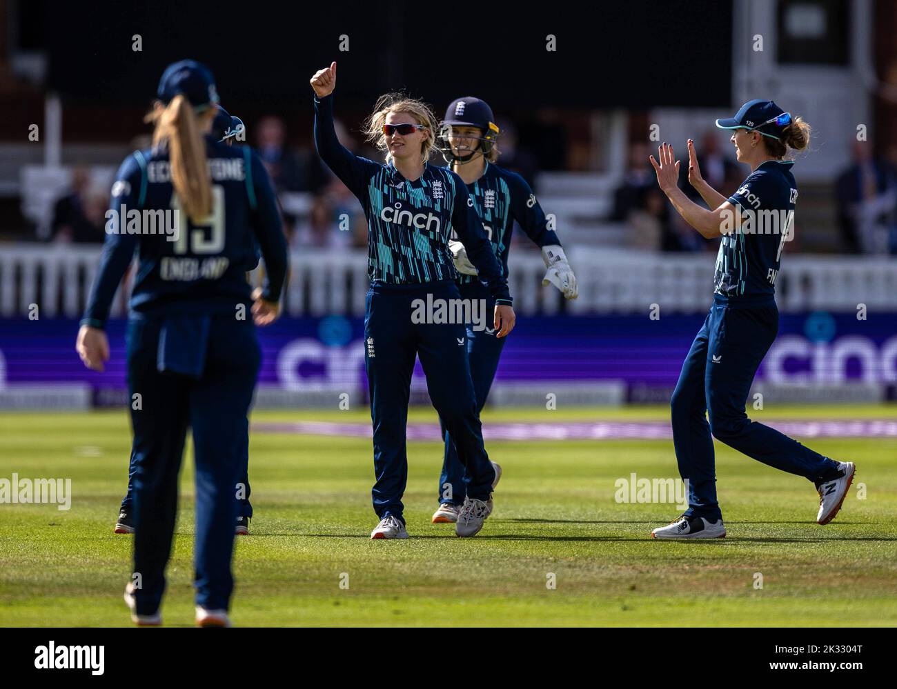 England's Charlie Dean celebrates with her teammates after taking the wicket of India’s Pooja Vastrakar (not in picture) during the third women's one day international match at Lord's, London. Picture date: Saturday September 24, 2022. Stock Photo