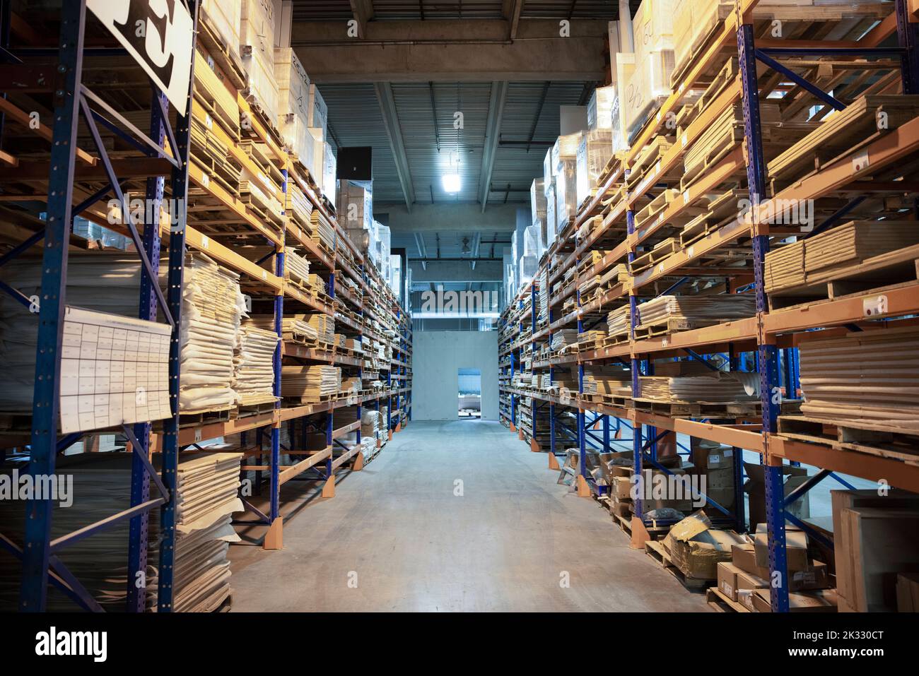 Distribution warehouse with high shelves Stock Photo