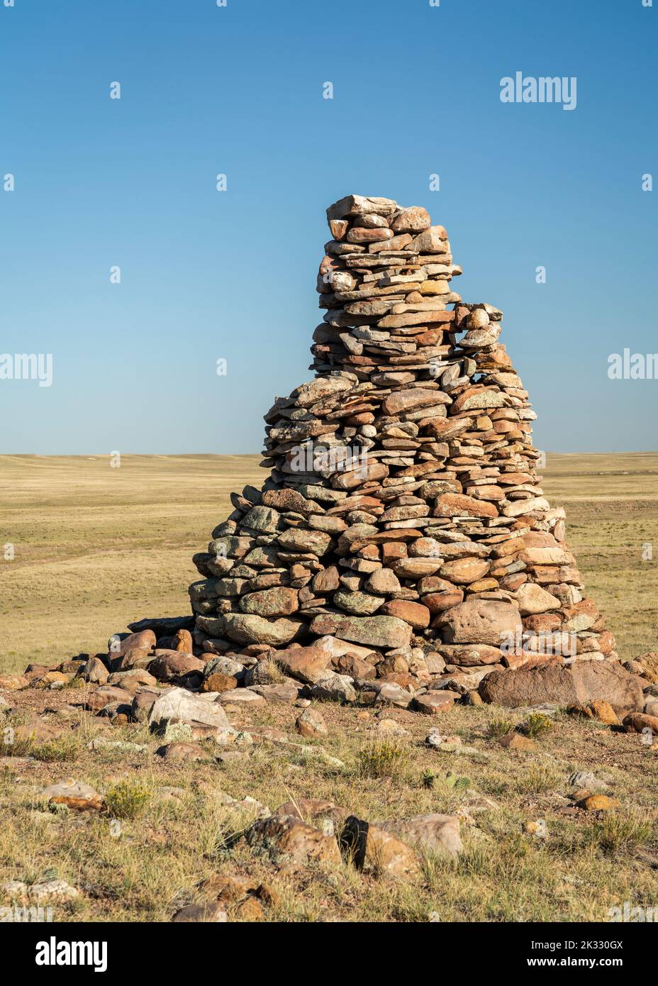 large stone cairn overlooking Colorado prairie, Soapstone Prairie Natural Area near Fort Collins, late summer or early fall Stock Photo