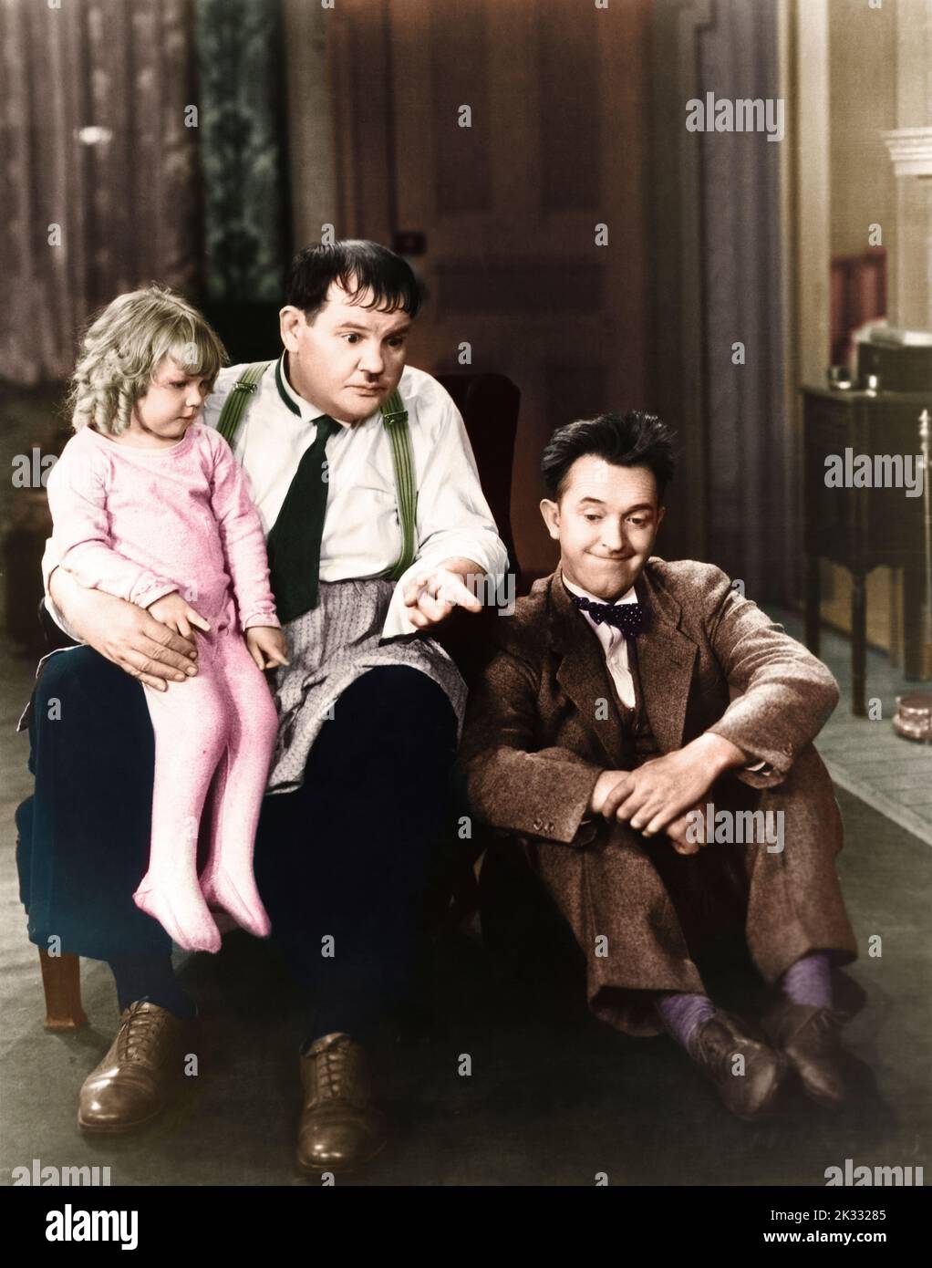 Stan Laurel and Oliver Hardy in the  film scene 'Pack Up Your Troubles' 1932 Stock Photo
