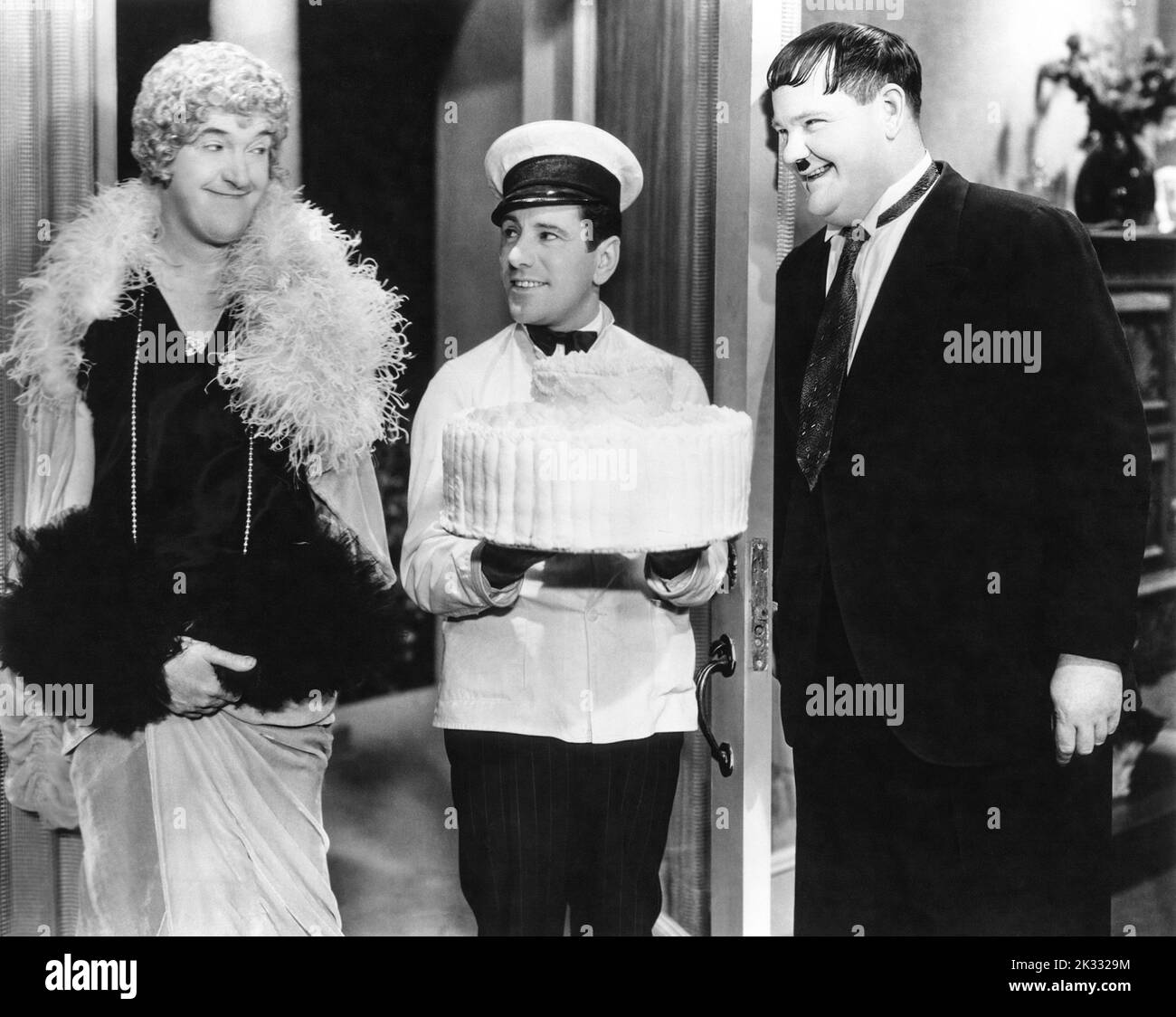 Stan Laurel and Oliver Hardy in the  film scene 'Twice Two' 1933 Stock Photo