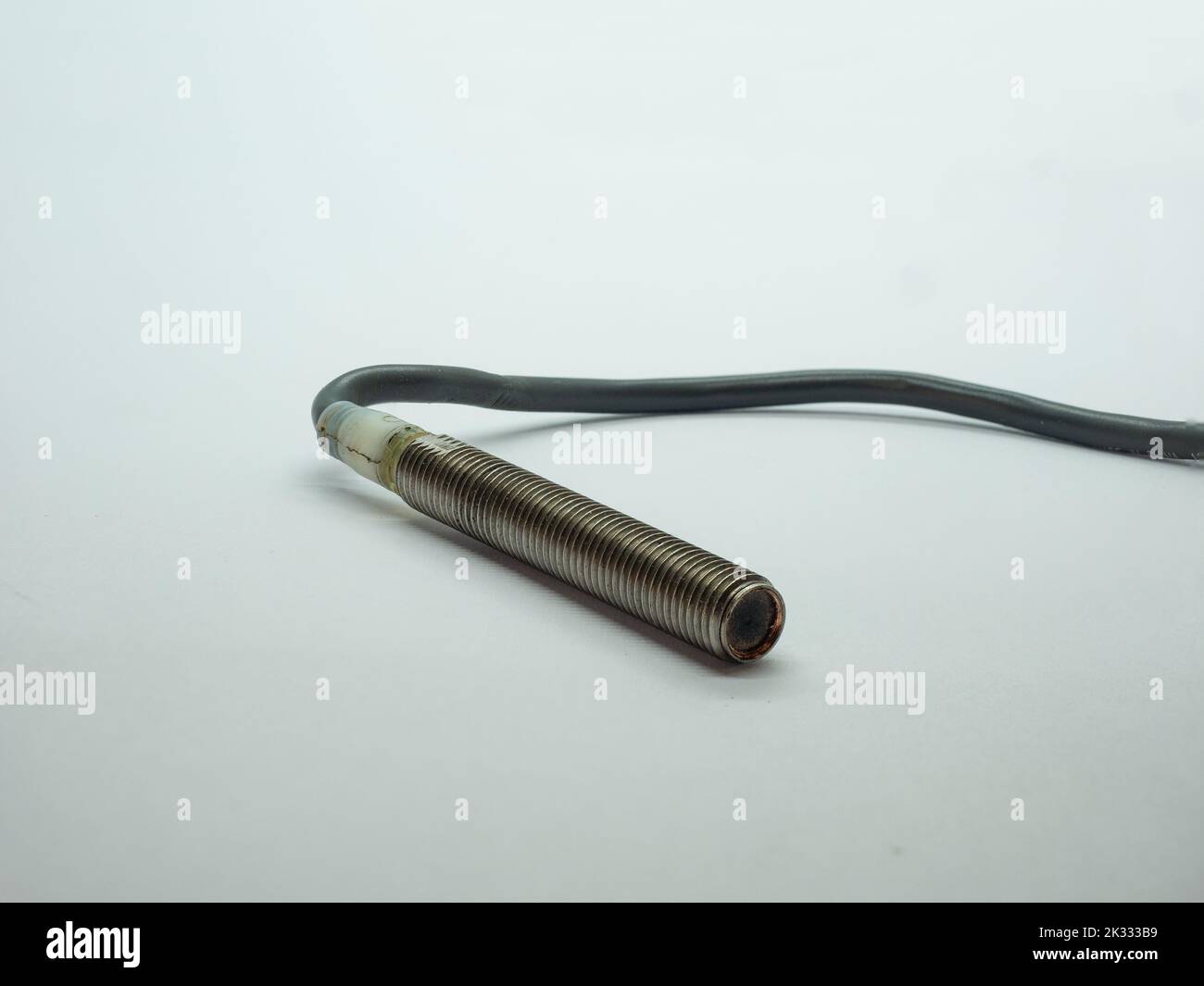 threaded  inductive proximity sensor with cable used in industrial automation and industry 4.0 Stock Photo