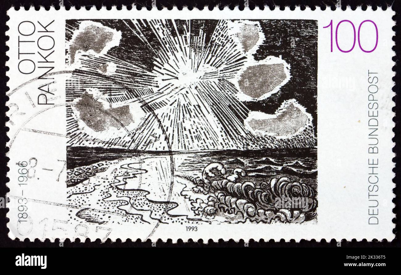 GERMANY - CIRCA 1993: a stamp printed in Germany shows Sea and Sun, painting by Otto Pankok, German painter, circa 1993 Stock Photo