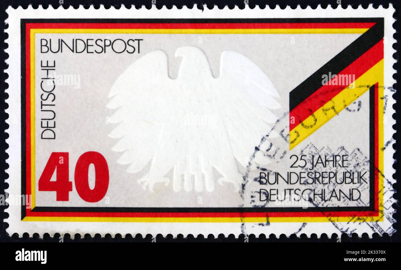 GERMANY - CIRCA 1974: a stamp printed in Germany shows Federal Eagle and Flag, Federal Republic of Germany, 25th anniversary, circa 1974 Stock Photo