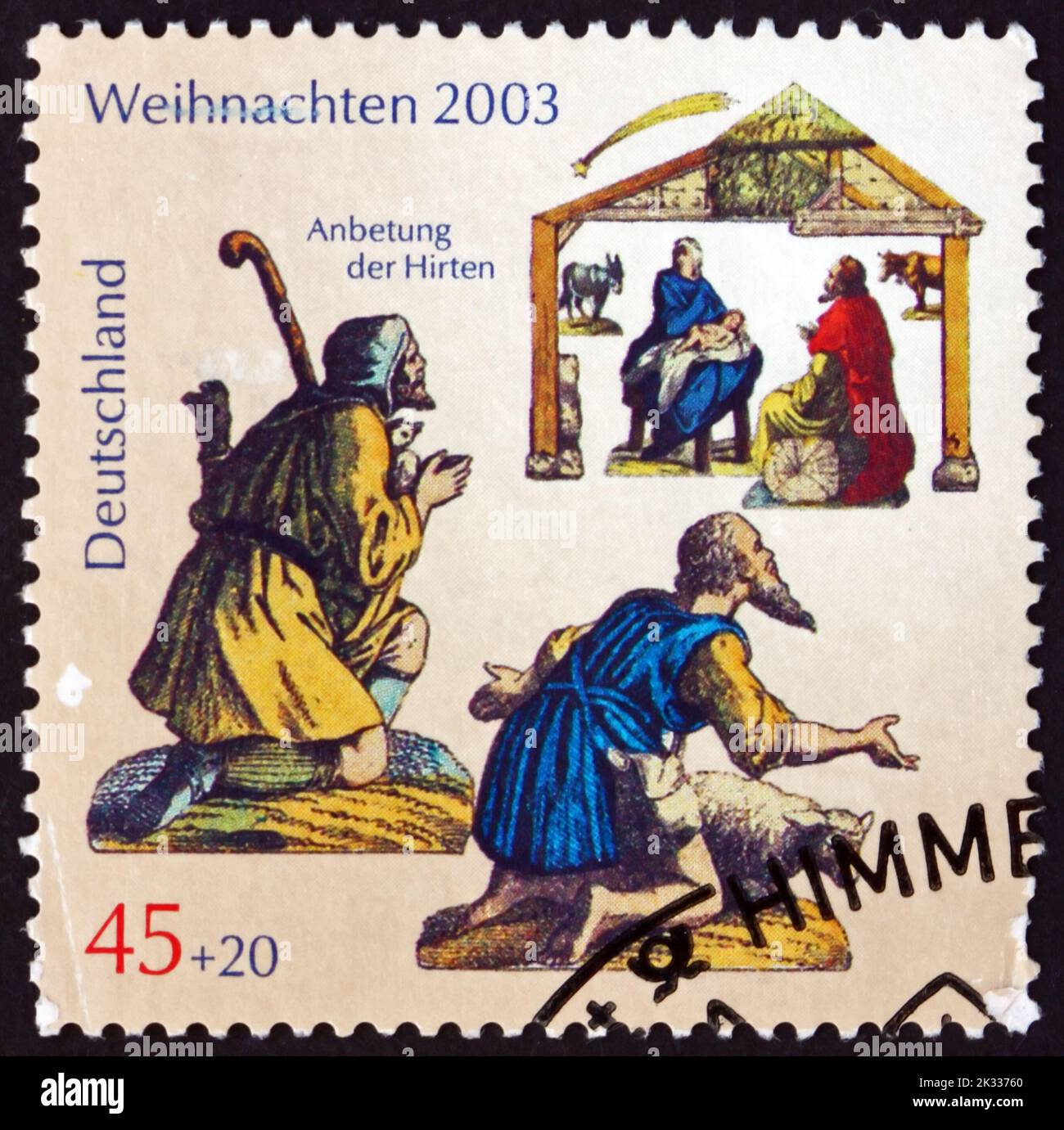 GERMANY - CIRCA 2003: a stamp printed in Germany shows Adoration of the Shepherds and Holy Family, Christmas, circa 2003 Stock Photo