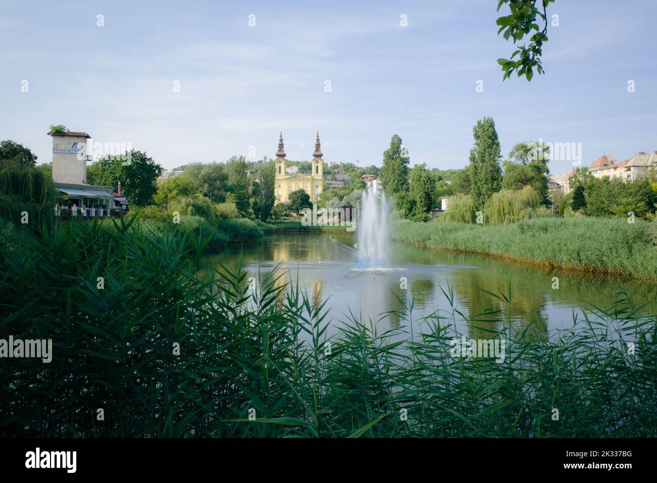 A beautiful shot of Lake Feneketlen and Saint Imre Church in Budapest, Hungary Stock Photo