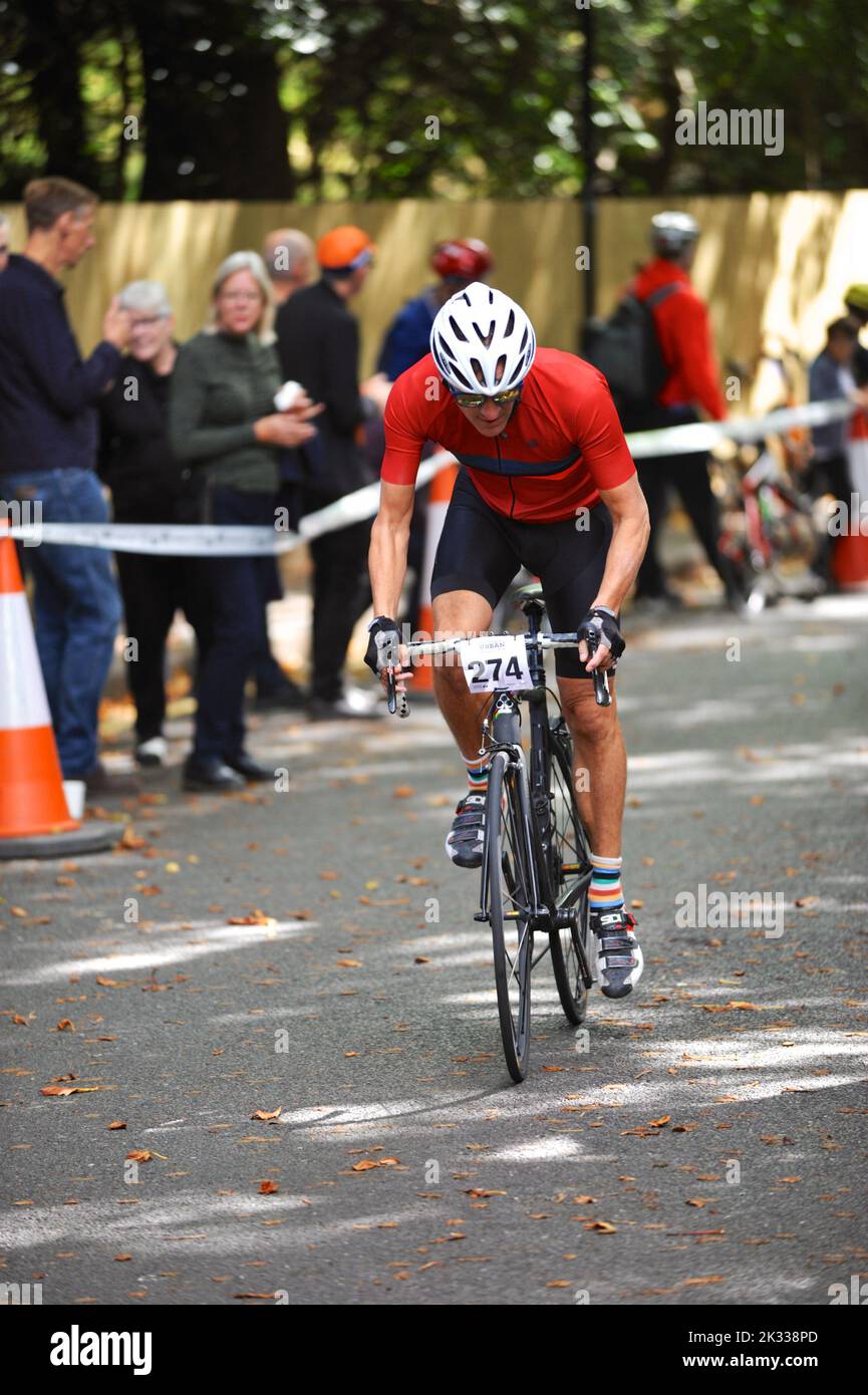 Adam Wolanski rider No. 274 straining as they race up Swains Lane in Highgate London during an Urban Hill Climb street racing event organised by the London Cycling Campaign sponsored by Osbornes