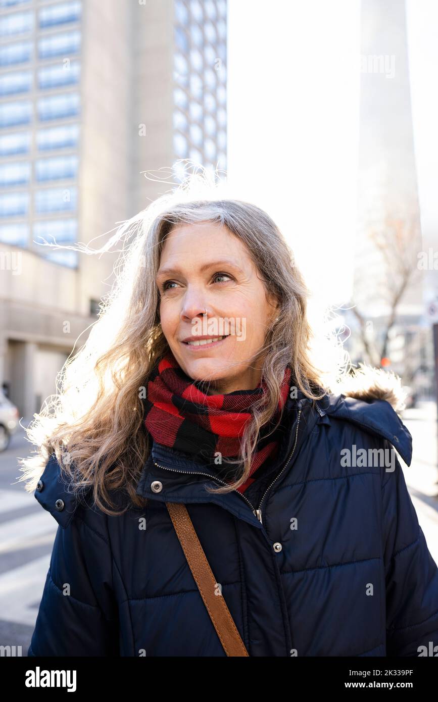 Mature woman standing street hi-res stock photography and images - Alamy