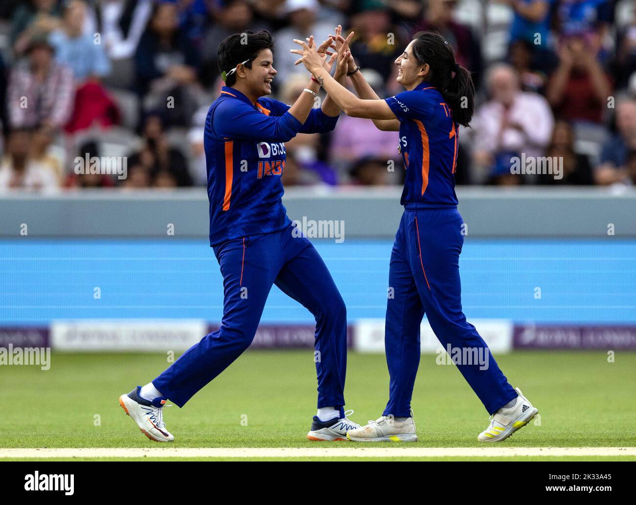 India’s Renuka Singh (right) celebrates with Shafali Verma the wicket of England's Emma Lamb (not in picture) during the third women's one day international match at Lord's, London. Picture date: Saturday September 24, 2022. Stock Photo