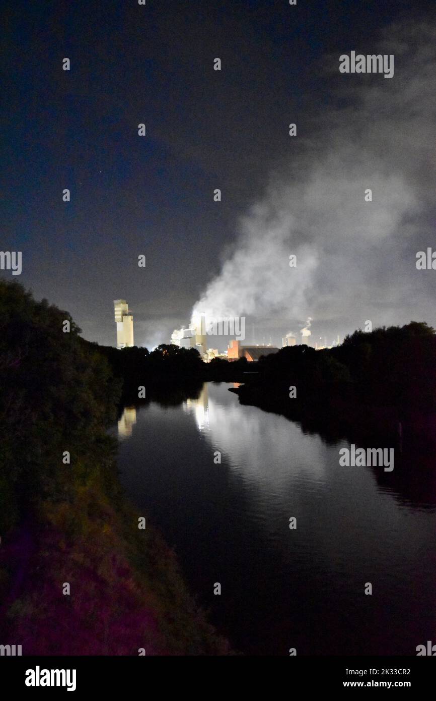 Teesside's CF Fertiliser plant (formerly part of ICI Billingham), photographed at night time, reflected in the still water of Billingham Beck. Stock Photo