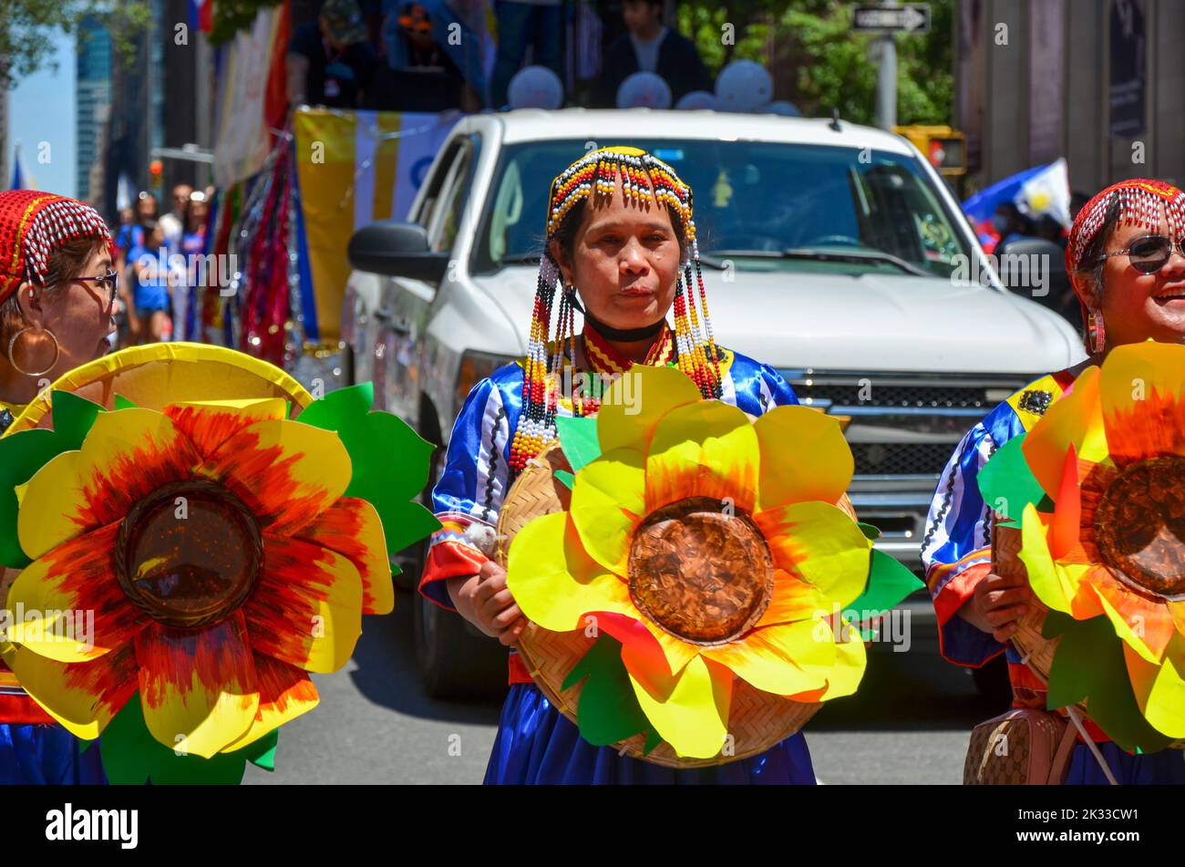 The participants in traditional Filipino outfits marching in the