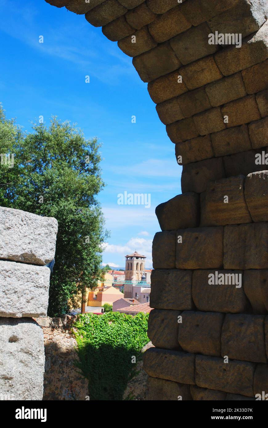 View trough an arch of the Roman aqueduct. Segovia, Spain. Stock Photo