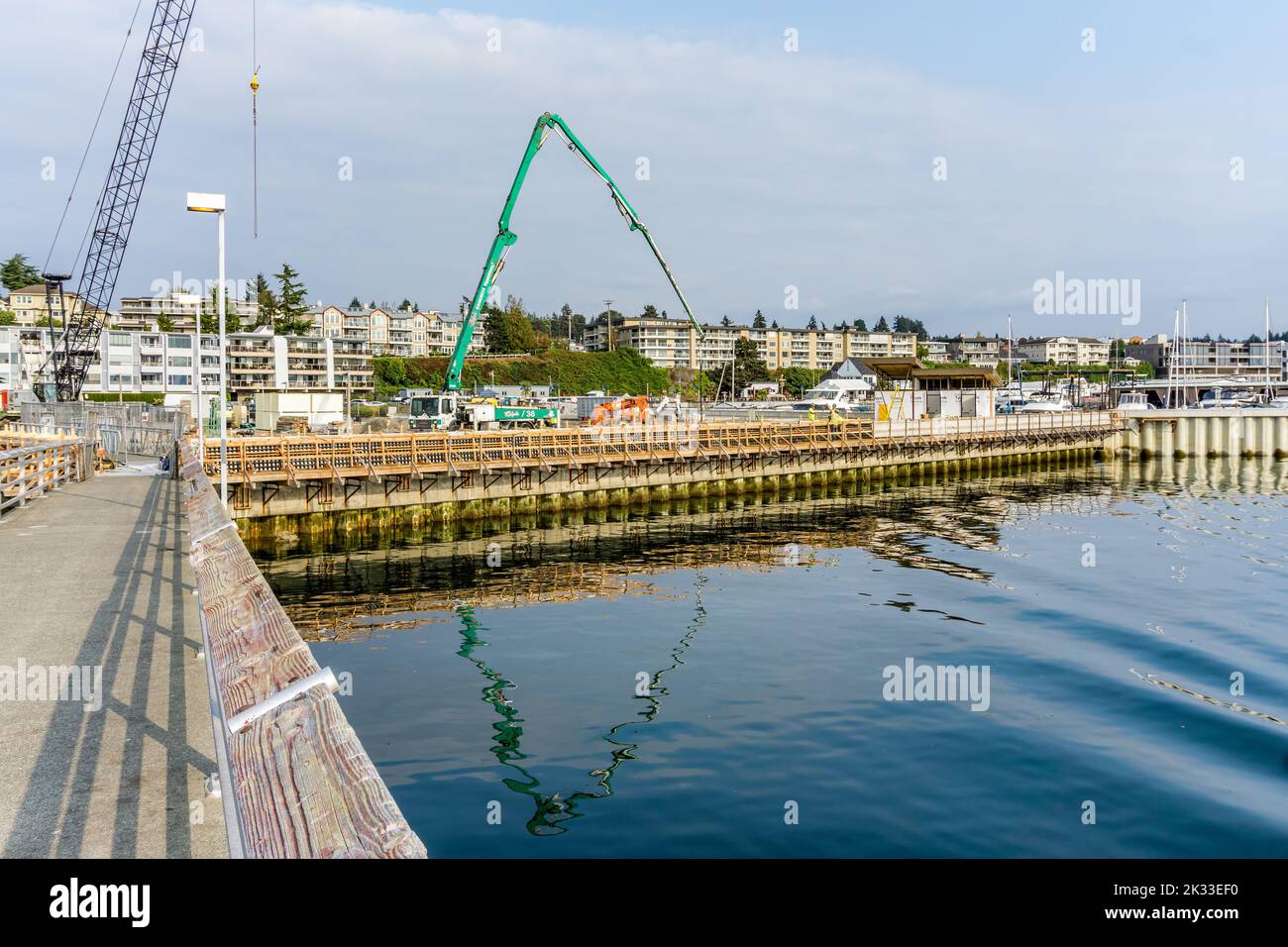 A crane at the Des Moines marina in Washington State shows that construction is happening. Stock Photo