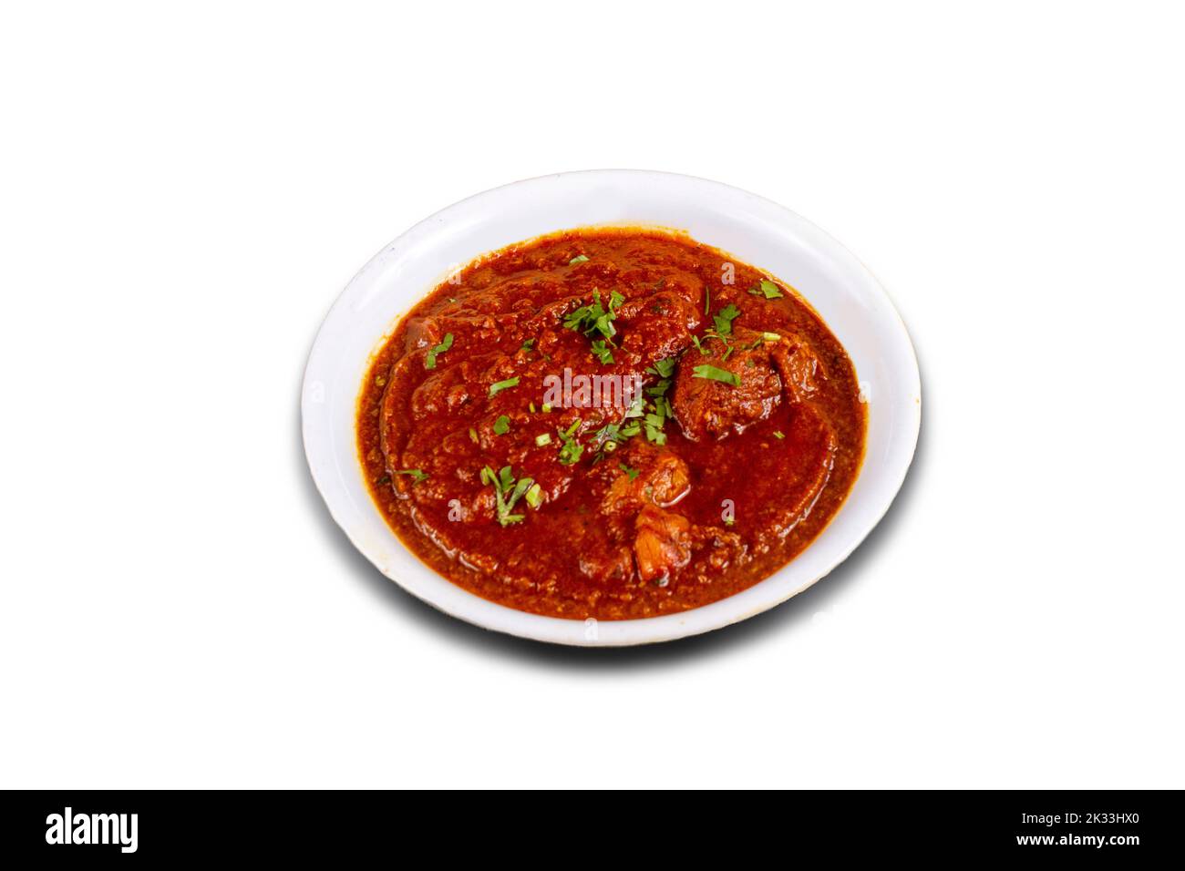 Spicy red chicken curry. Goan style chicken vindaloo. Butter chicken Murgh Makhani curry roast hot and spicy gravy dish Dhaba Punjab, India. North Ind Stock Photo