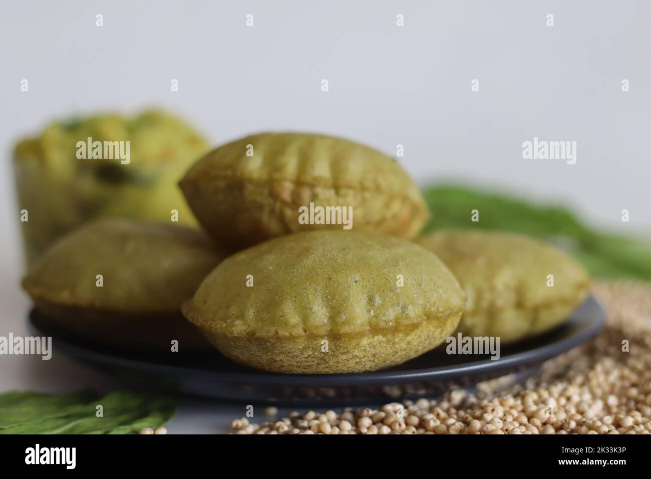 Jowar palak puri or spinach fried flat bread. Fried bread made