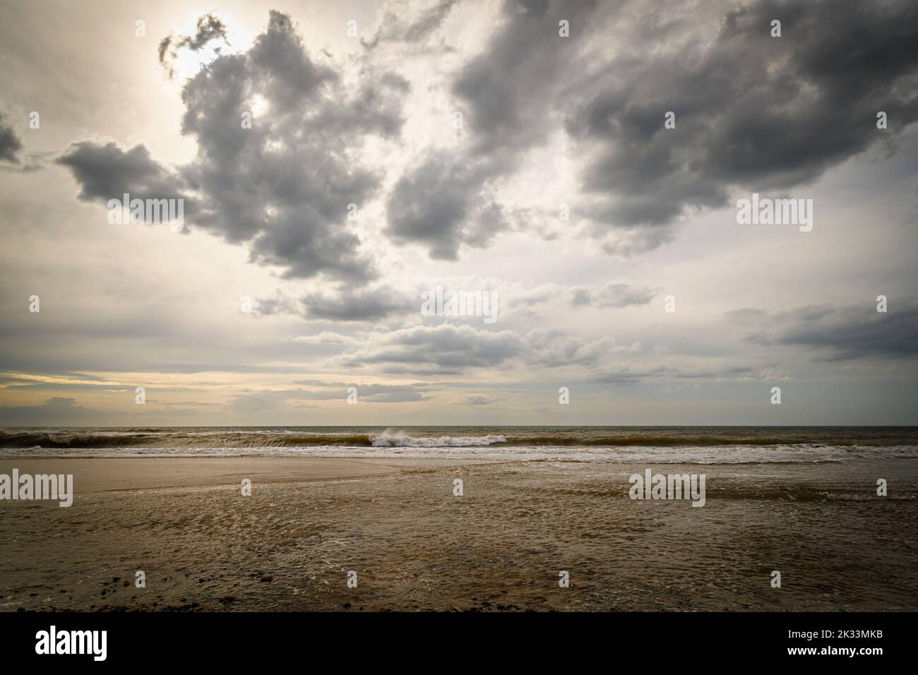 An autumnal HDR seacape image of Fleetwood beach with calm seas, hazy sun and solitude, Lancashire, England. 05 September 2022 Stock Photo