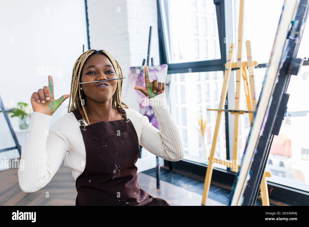 Young african student with septum nose piercing at the art studio Stock Photo