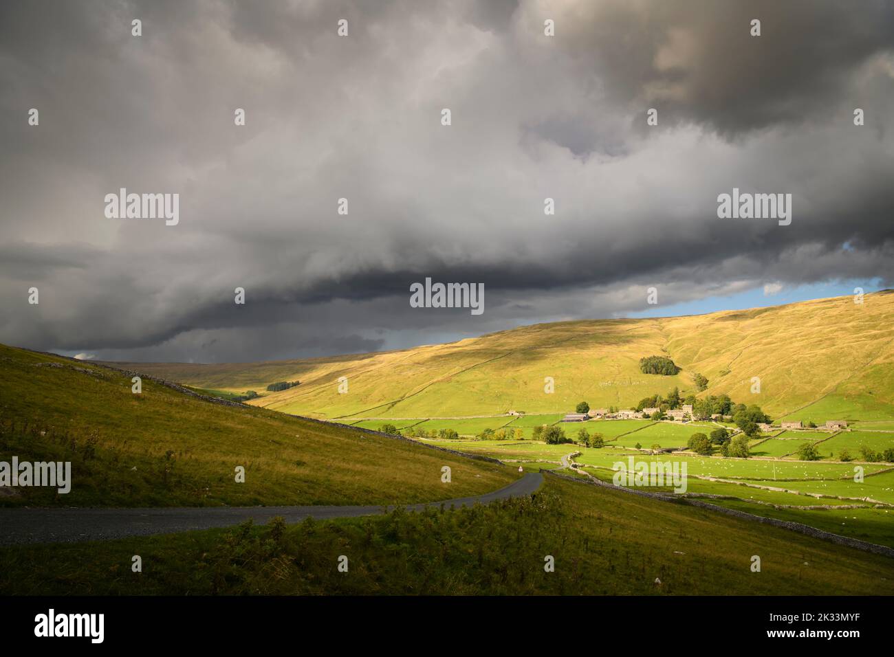 An autumnal HDR image of remote sunny hamlet of Halton Gill and incomming rain at the head of Littondale, North Yorkshire, England. 23 September 2022 Stock Photo