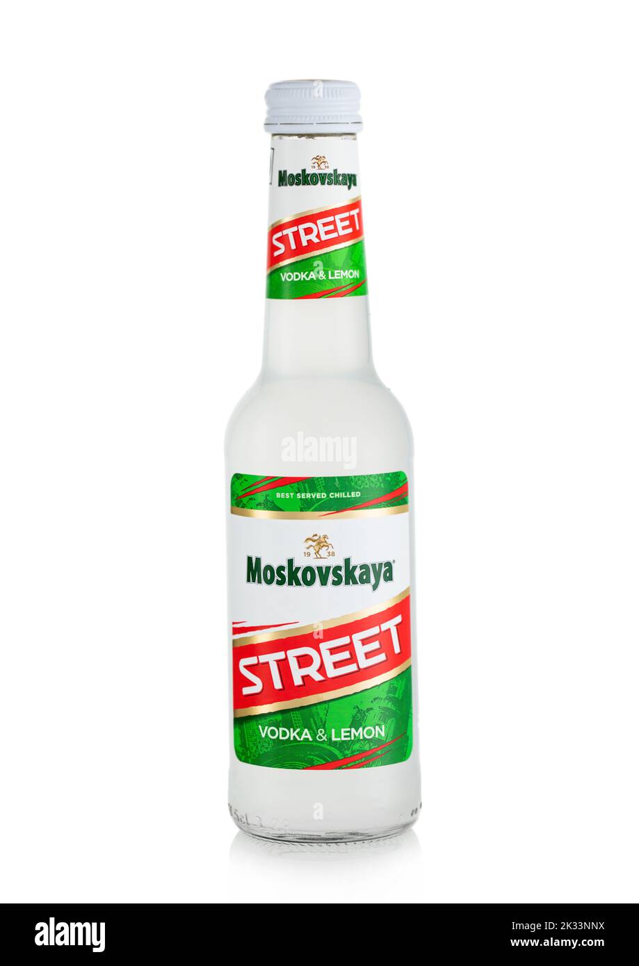 LONDON,UK - MAY 12, 2022: Bottle of Moskovskaya street vodka and lemon mixed drink on white. Stock Photo