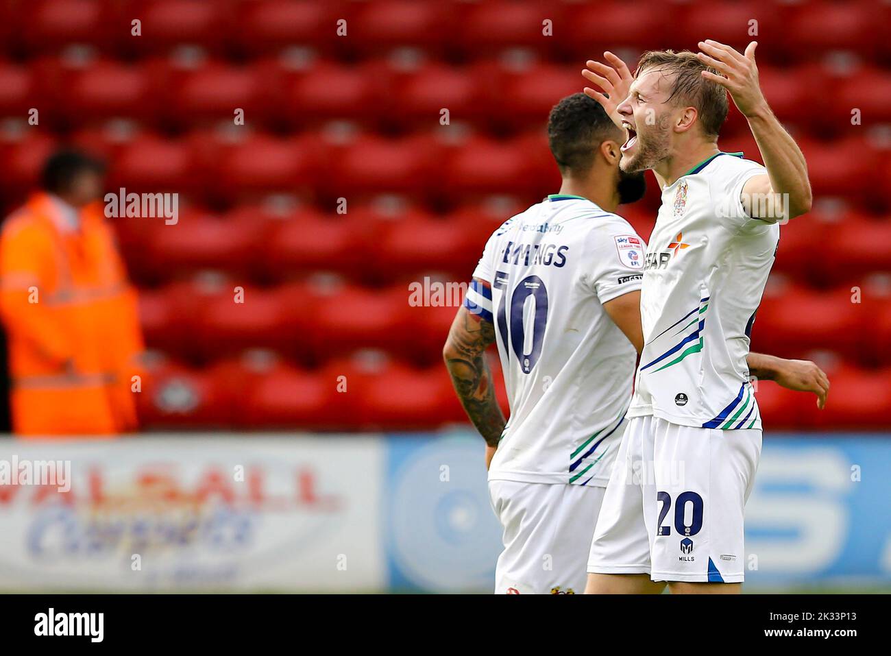 Walsall, UK. 24th Sep, 2022. Elliott Nevitt of Tranmere Rovers (20) celebrates with his teammates after scoring his teams 1st goal. EFL Skybet Football league two match, Walsall v Tranmere Rovers at the Poundland Bescot Stadium in Walsall, West Midlands on Saturday 24th September 2022. this image may only be used for Editorial purposes. Editorial use only, license required for commercial use. No use in betting, games or a single club/league/player publications.pic by Chris Stading/Andrew Orchard sports photography/Alamy Live News Credit: Andrew Orchard sports photography/Alamy Live News Stock Photo
