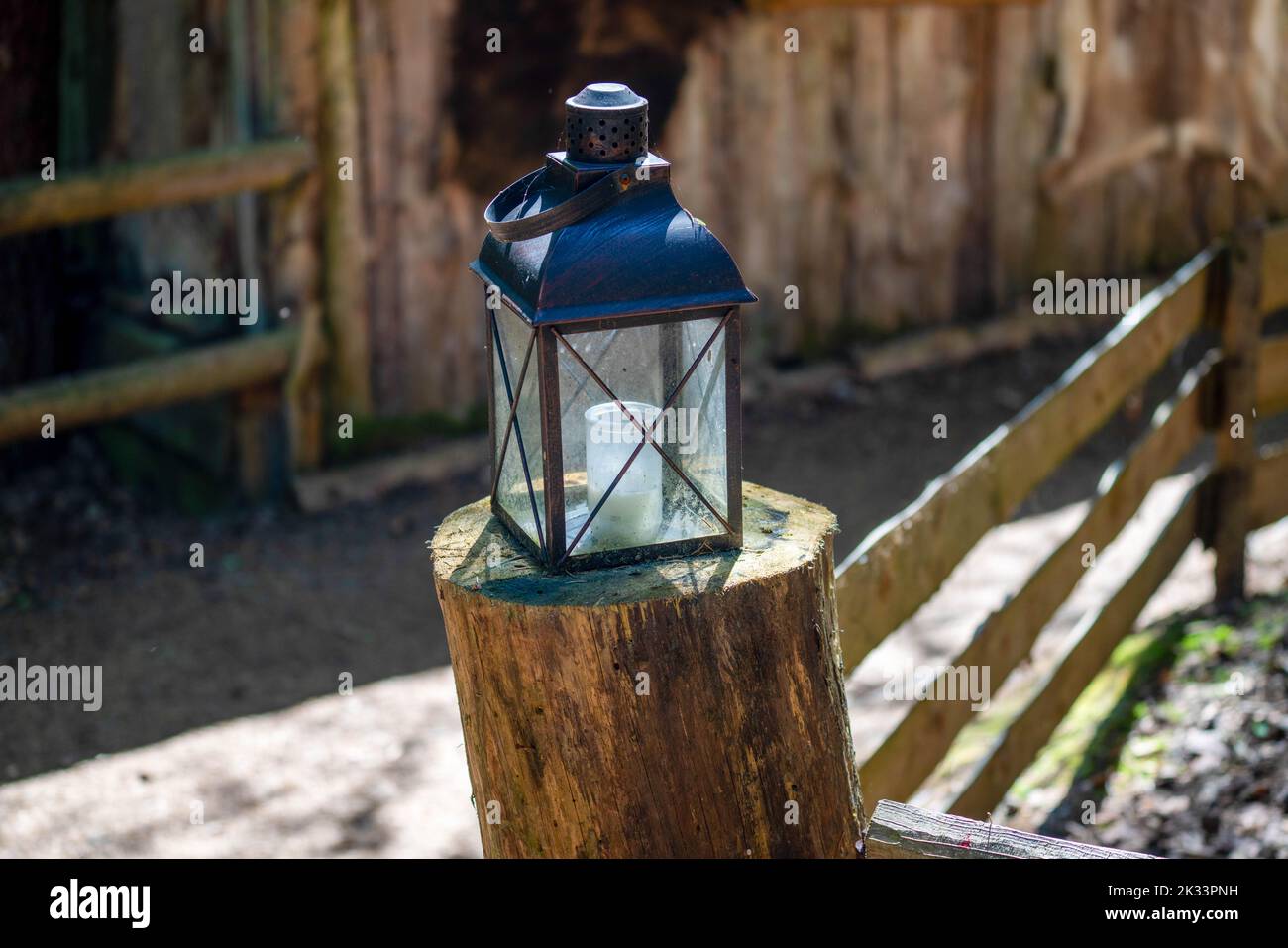 Metal lantern on fence hi-res stock photography and images - Alamy