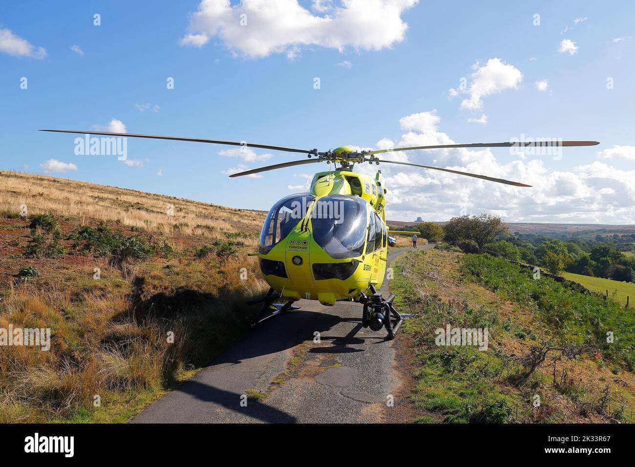 The Yorkshire Air Ambulance makes a landing on the North Yorkshire Moors, after a man fell from the station platform at Goathland Station Stock Photo