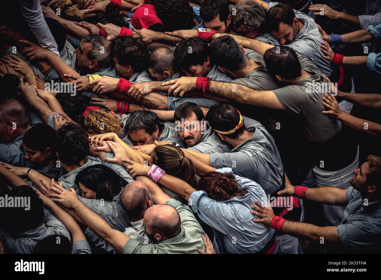 Barcelona, Spain. 24th Sep, 2022. The 'Castellers de Sants' gather to form the base of a human tower during the 'Diada Castellera' at Barcelona's city festival 'La Merce' Credit: Matthias Oesterle/Alamy Live News Stock Photo