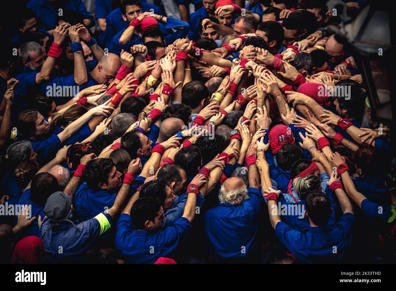 Barcelona, Spain. 24th Sep, 2022. The 'Castellers de Gracia' gather to form the base of a human tower during the 'Diada Castellera' at Barcelona's city festival 'La Merce' Credit: Matthias Oesterle/Alamy Live News Stock Photo