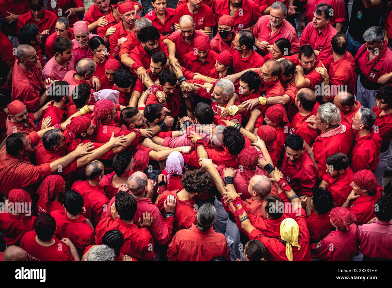 Barcelona, Spain. 24th Sep, 2022. The 'Castellers de Barcelona' gather to form the base of a human tower during the 'Diada Castellera' at Barcelona's city festival 'La Merce' Credit: Matthias Oesterle/Alamy Live News Stock Photo