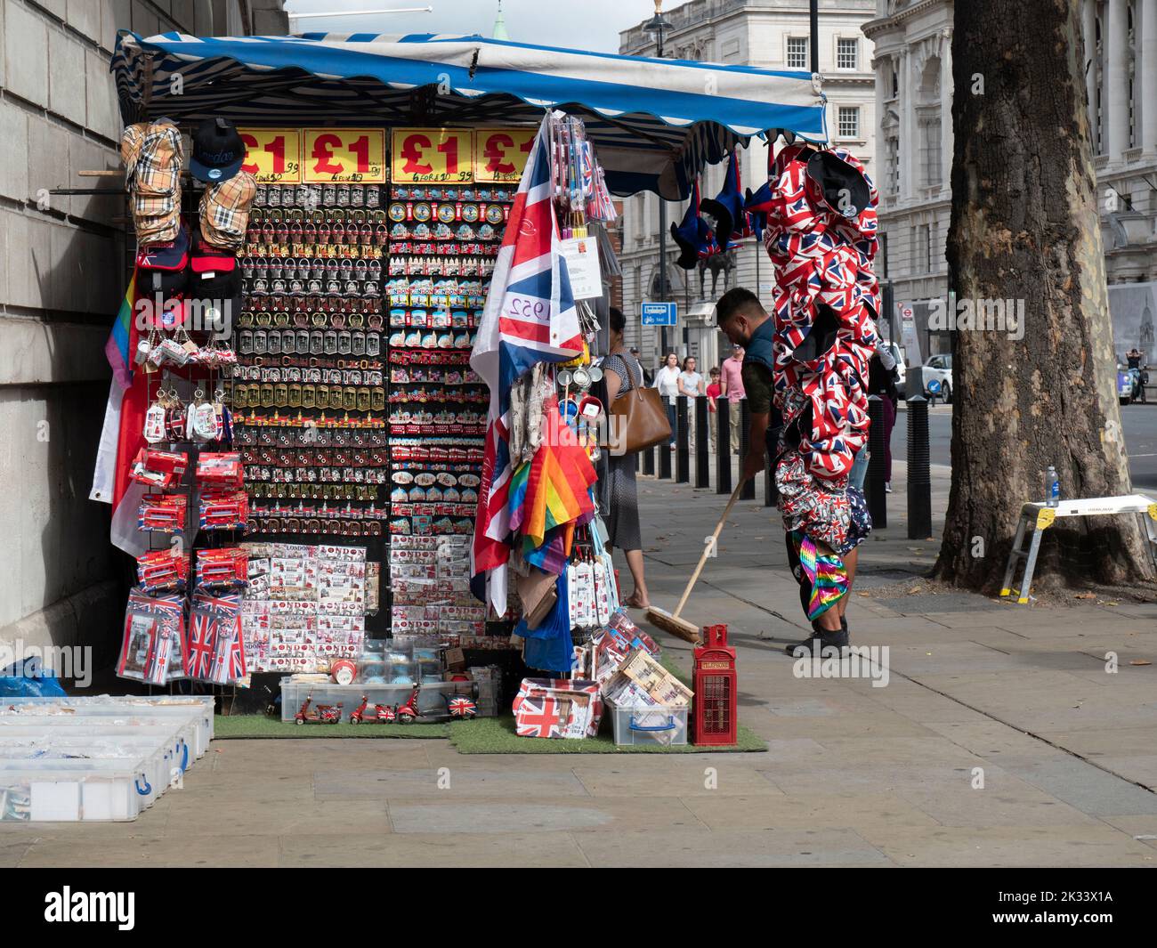 Souvenir stall in Whitehall London, with pound sterling signs and London tourist goods for sale Stock Photo