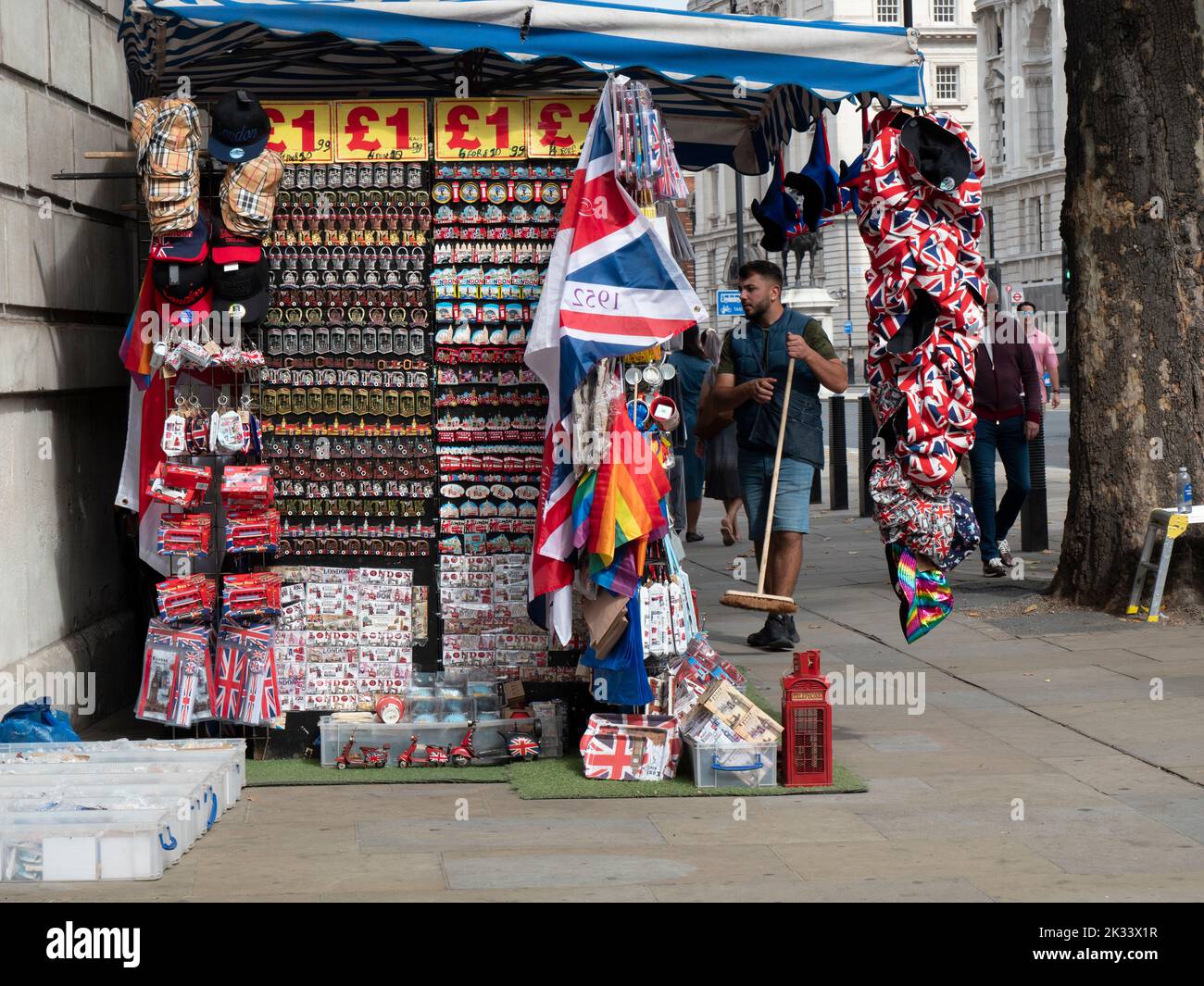 Souvenir stall in Whitehall London, with pound sterling signs and London tourist goods for sale Stock Photo
