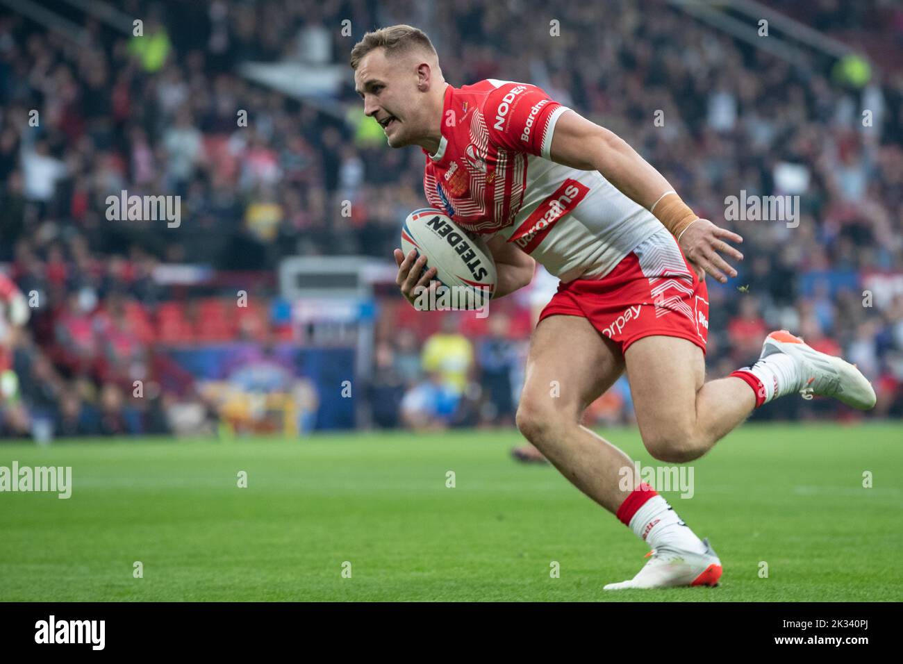 Matty Lees 10 of St Helens breaks away from the Leeds defence and goes