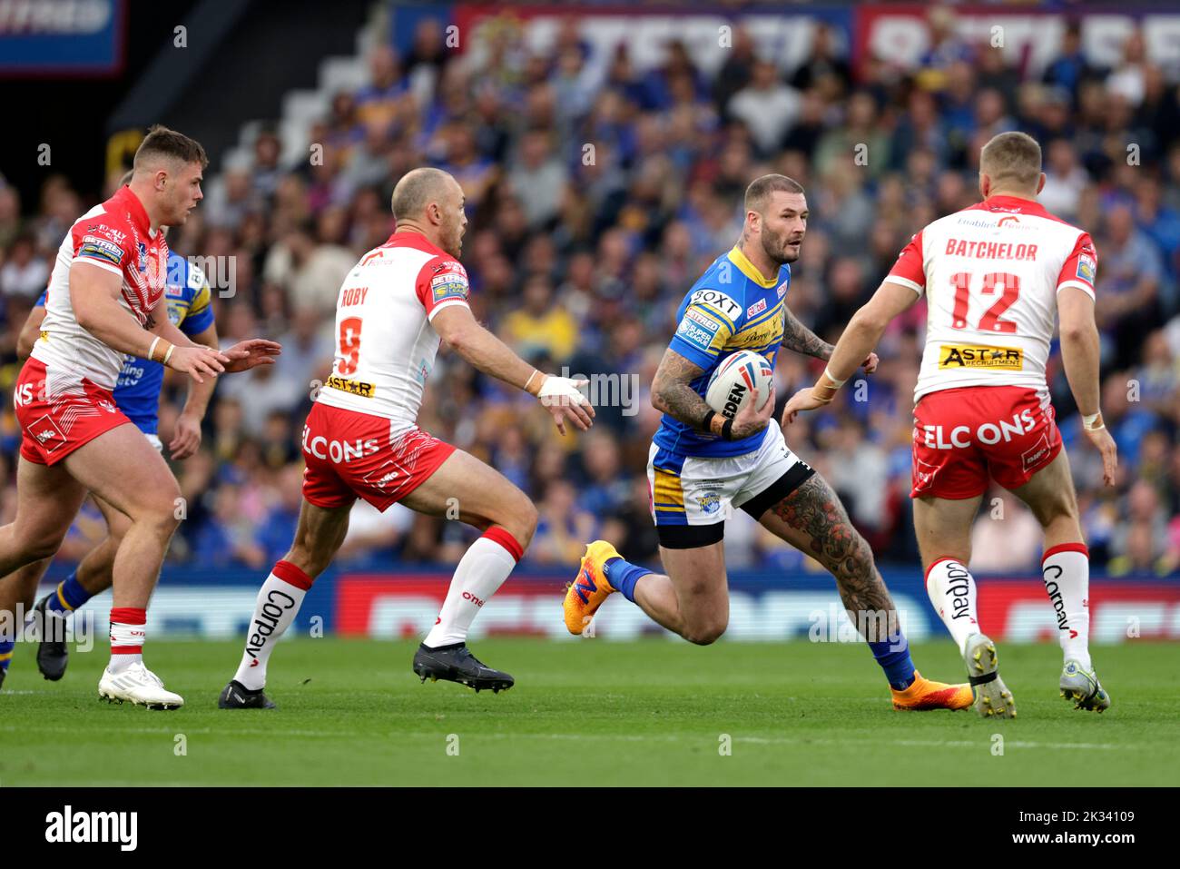 Leeds Rhinos' Zak Hardaker attempts to get past Leeds Rhinos' Kruise Leeming and Rhyse Martin (right)during the Betfred Super League Grand Final at Old Trafford, Manchester. Picture date: Saturday September 24, 2022. Stock Photo
