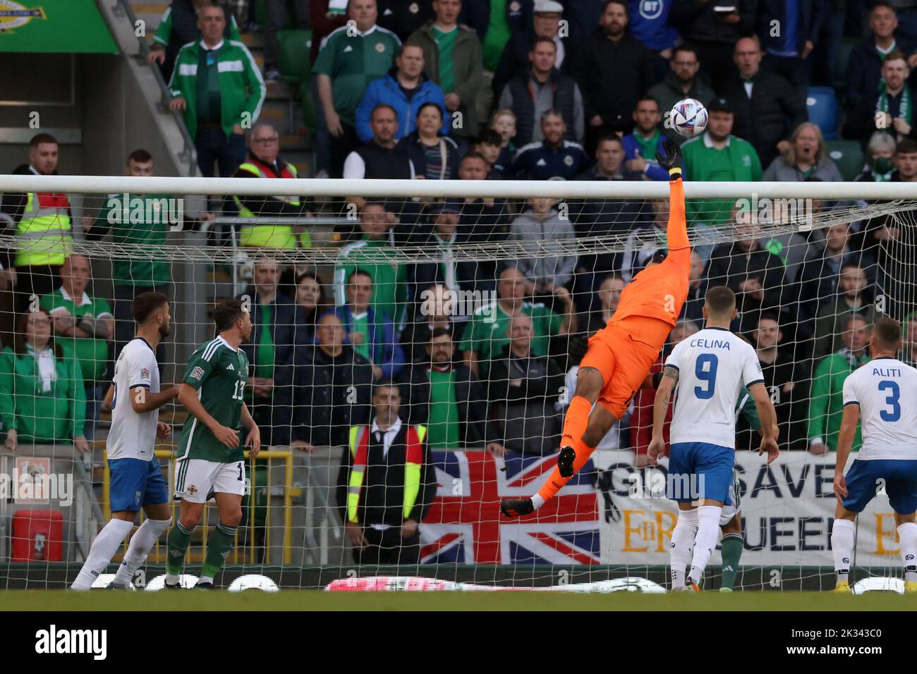 Kosovo goalkeeper Arijanet Muric tips the ball over after a header from Northern Ireland's Josh Magennis during the UEFA Nations League Group J Match at Windsor Park, Belfast. Picture date: Saturday September 24, 2022. Stock Photo